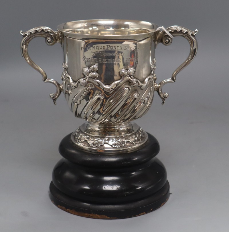 A late Victorian demi-spiral fluted silver two handled silver trophy cup, Aldwinckle & Slater, London, 1892, 13.9cm, 15.5oz.